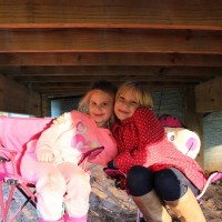 Lily and Hope camping under Toni's Deck.