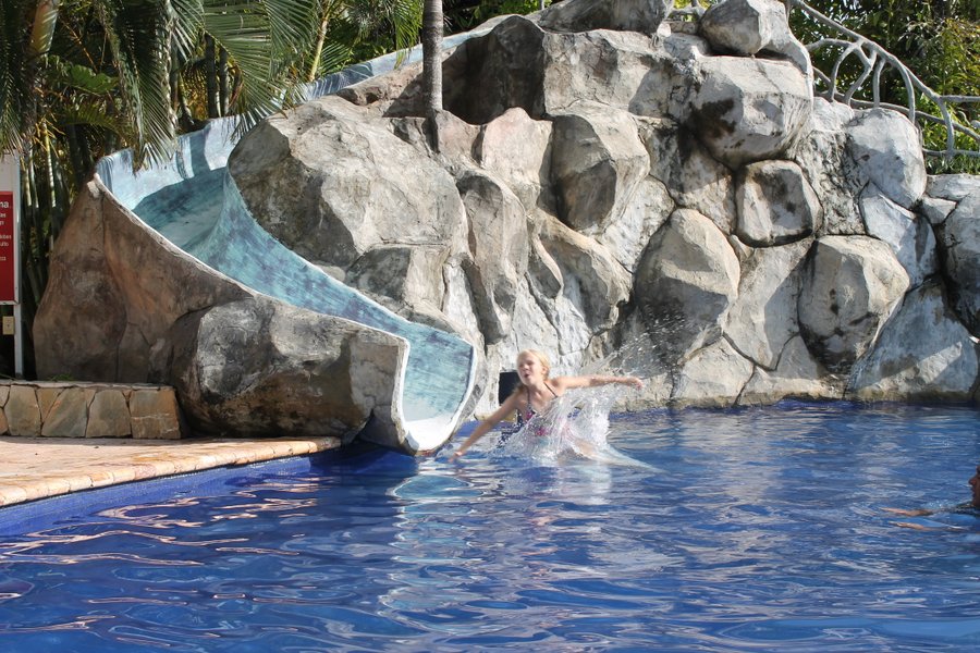 Splashing off the slide.