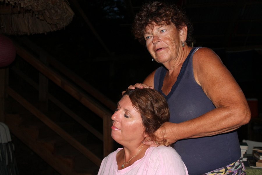 Susie giving Shelly a neck message. Susie is a massage therapist and is in much demand among cruisers who have fought down too many loose sails or tripped over too many unforgiving cleats. 