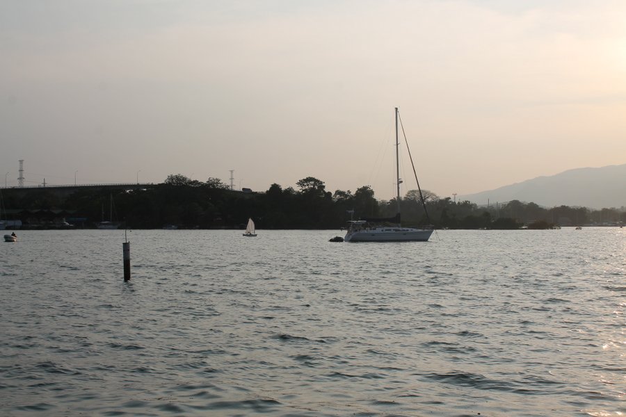 Big Boat. Little Boat. That is a little opti on the water like the ones Lily sailed at St Petersburg Sailing School. She gets excited watching it.