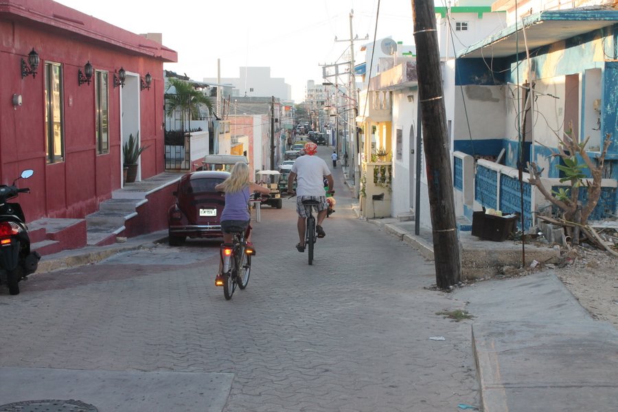 Biking on an Isla Mujeres back street. It is nice to have the street to ourselves. The sidewalks are a bit narrow.